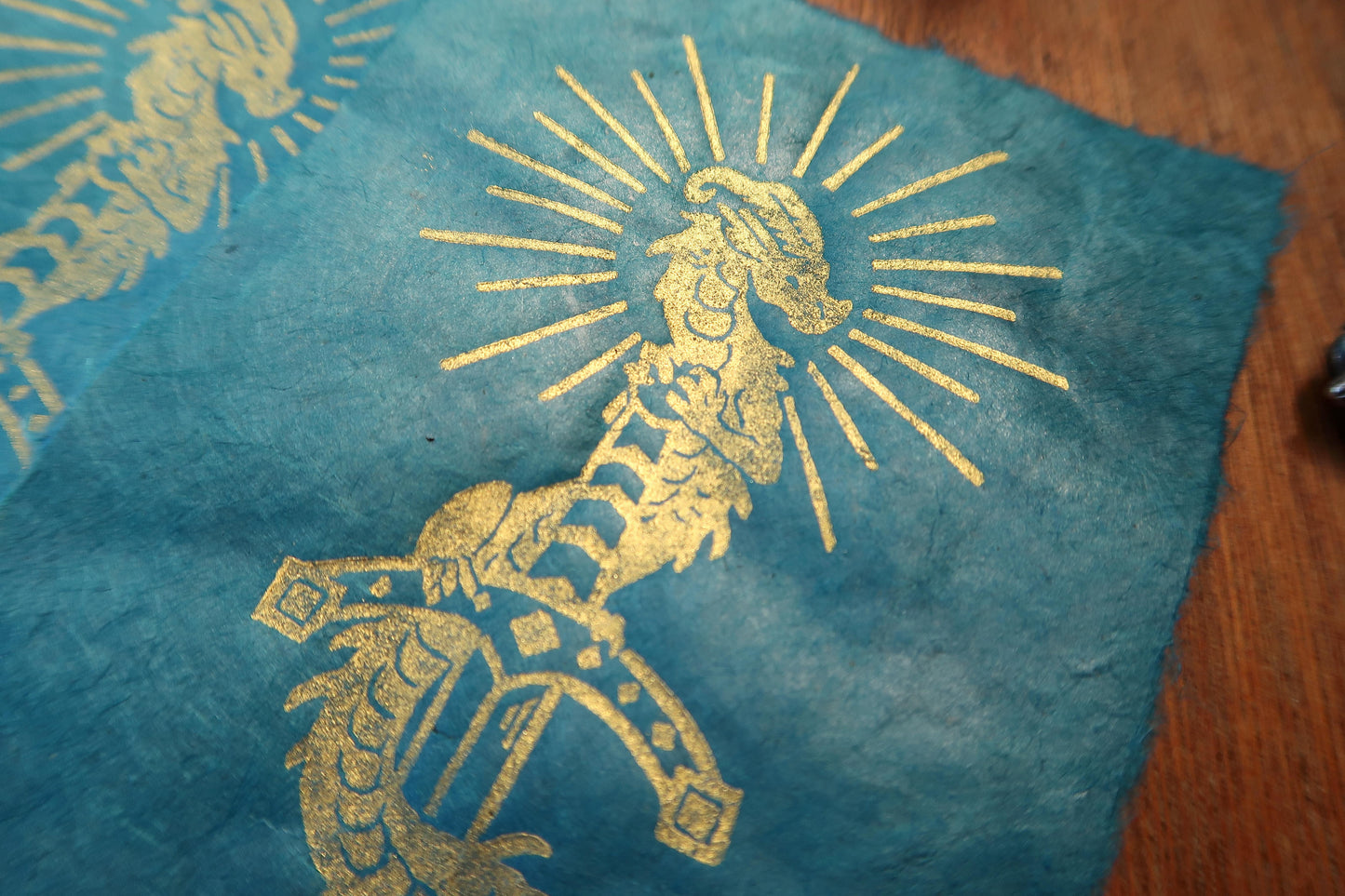 Tiny Sword & Dragon - Gold Linocut print on blue, red or black paper