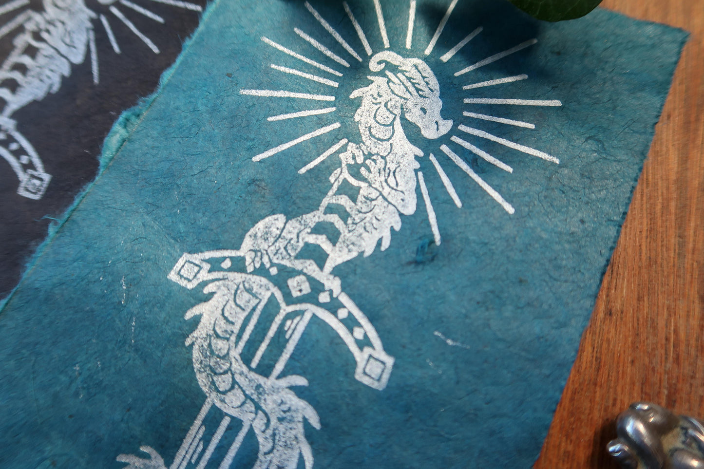 Tiny Sword & Dragon - Silver Linocut print on blue or black paper
