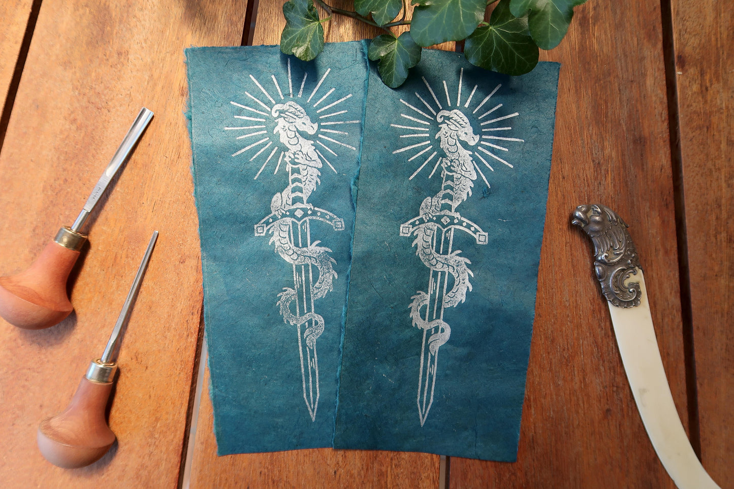 Tiny Sword & Dragon - Silver Linocut print on blue or black paper