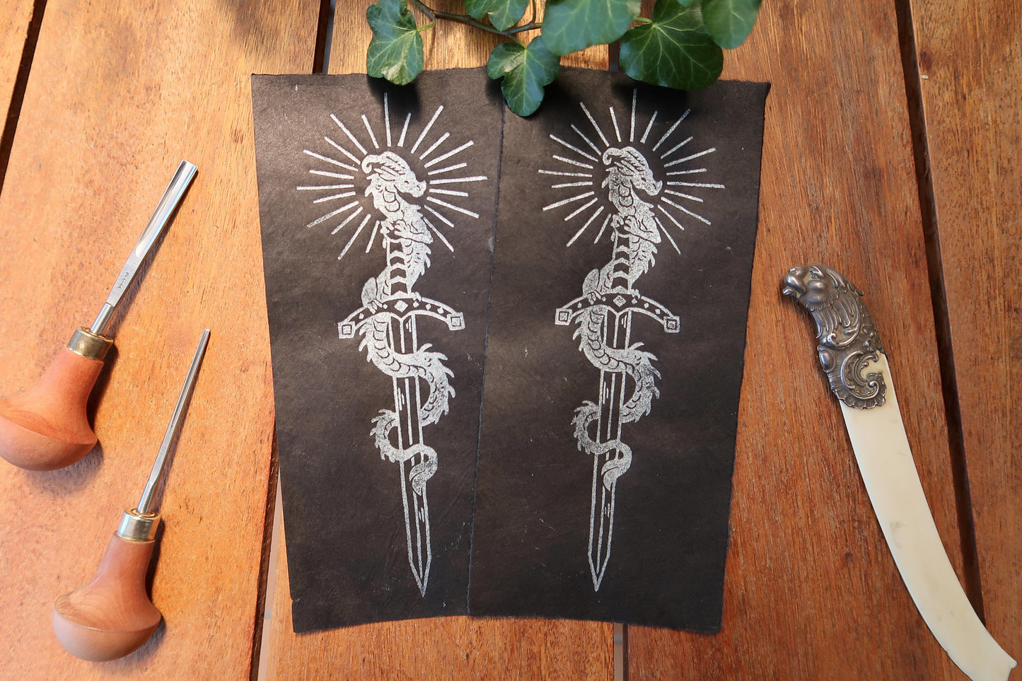 Tiny Sword & Dragon - Silver Linocut print on blue or black paper