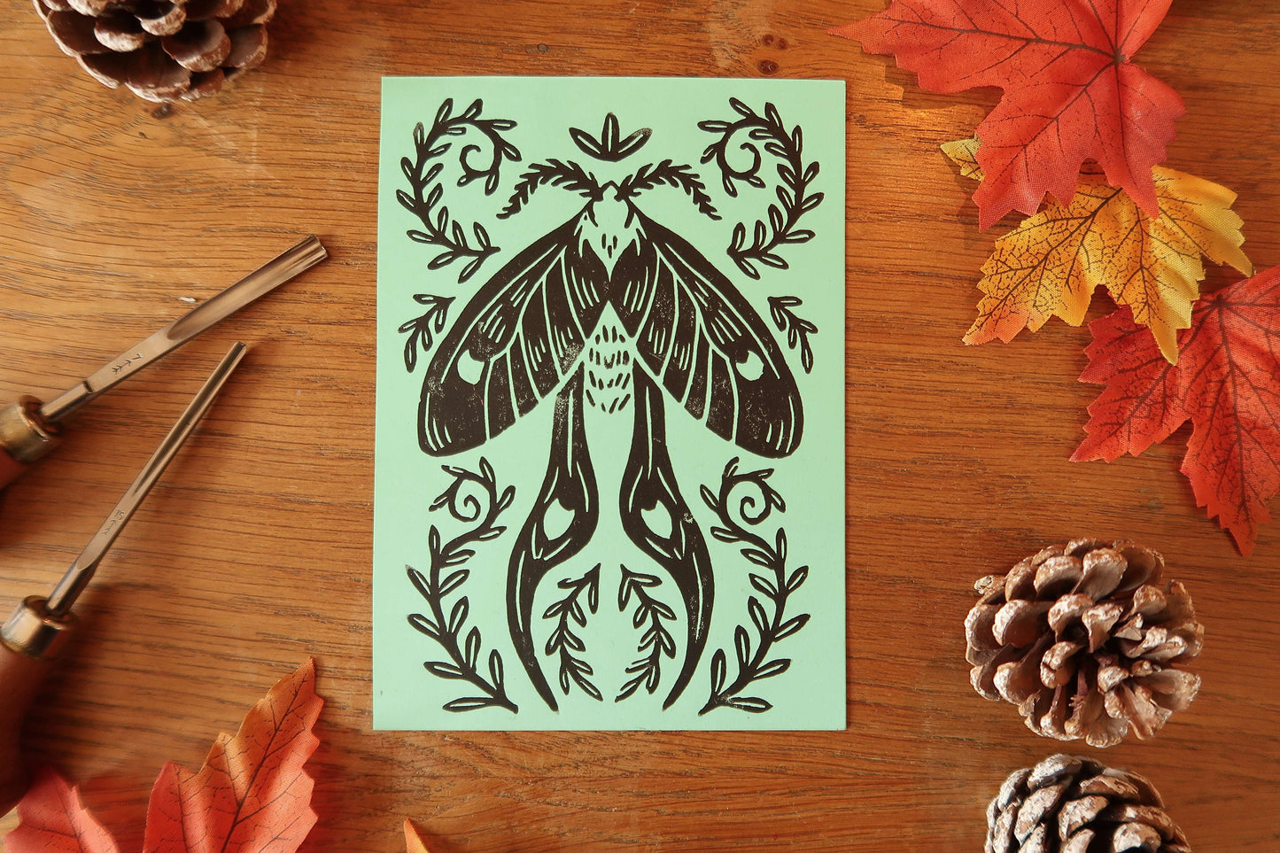 Tiny Moth - Linocut print on Mint colored paper