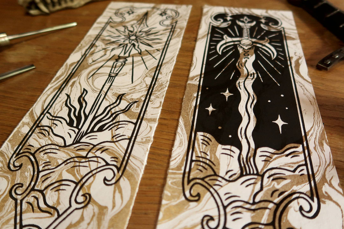 Medieval sword and spear - Linocut print on gold marbled paper