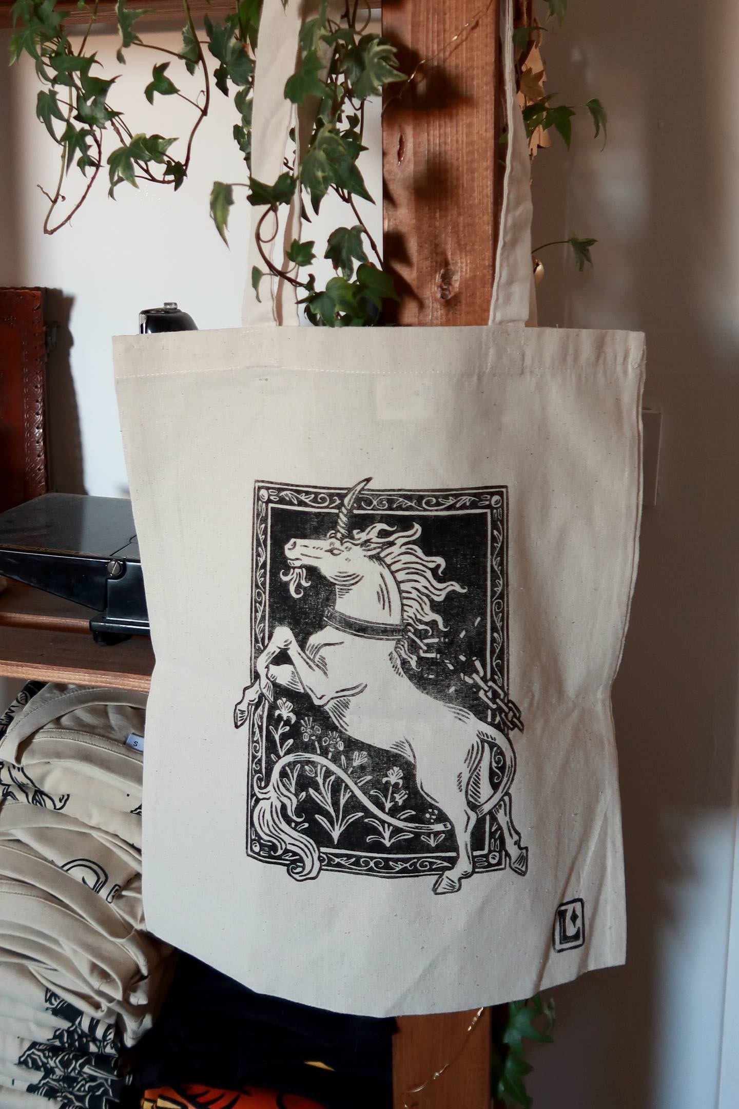 Unchained Unicorn - linocut printed tote bag