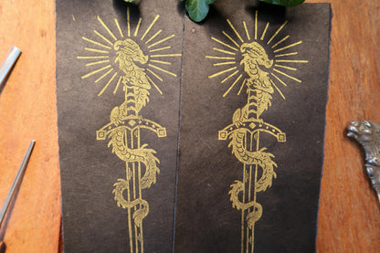 Tiny Sword & Dragon - Gold Linocut print on blue, red or black paper