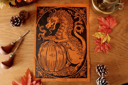 Pumpkin dragon 1- Linocut print on Burnt orange