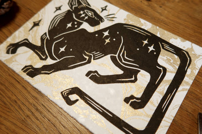 Star cat -  Linocut print on white and gold marble paper